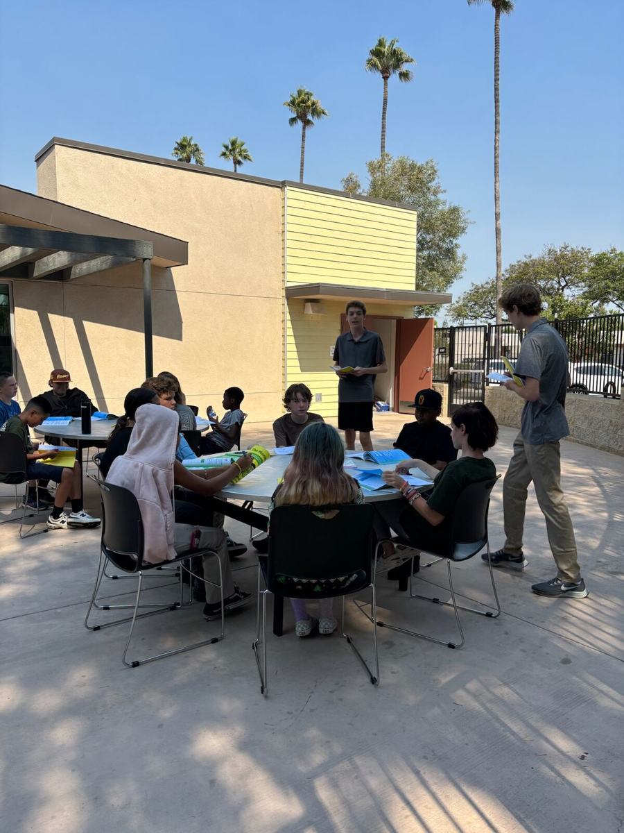 Tables set up outdoors for a camp session