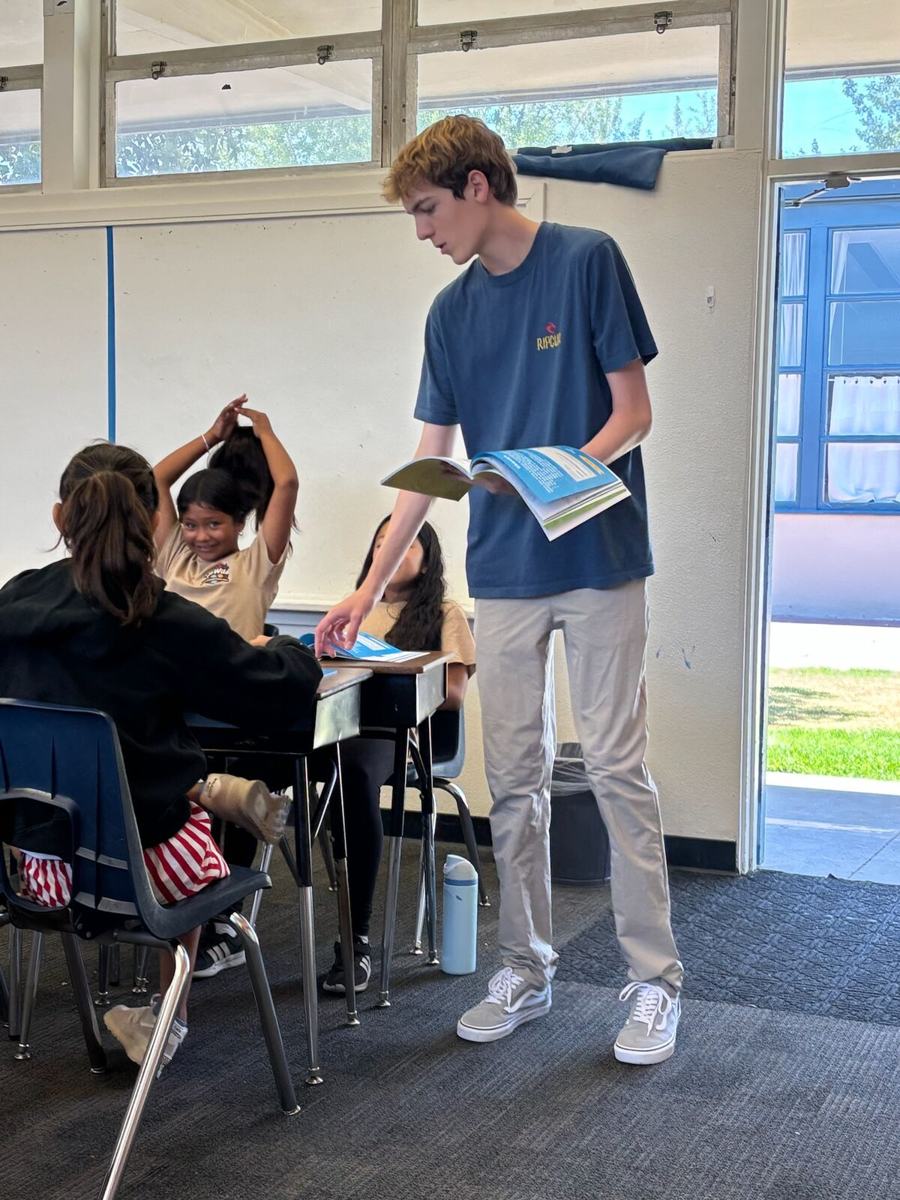 Handing out workbooks