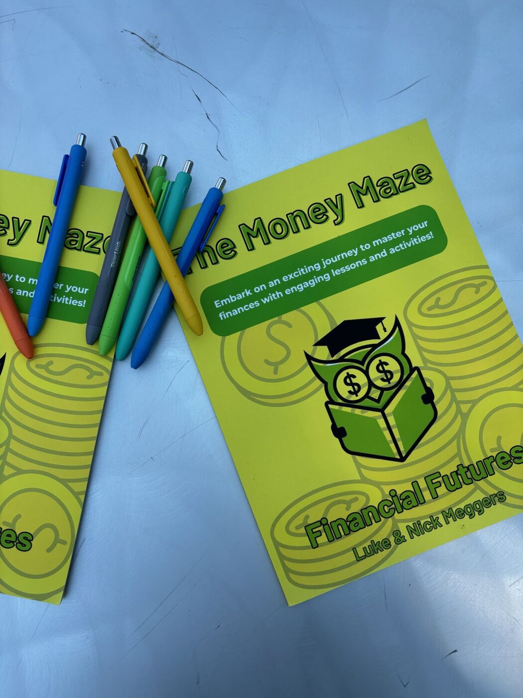 The Money Maze and colored pens